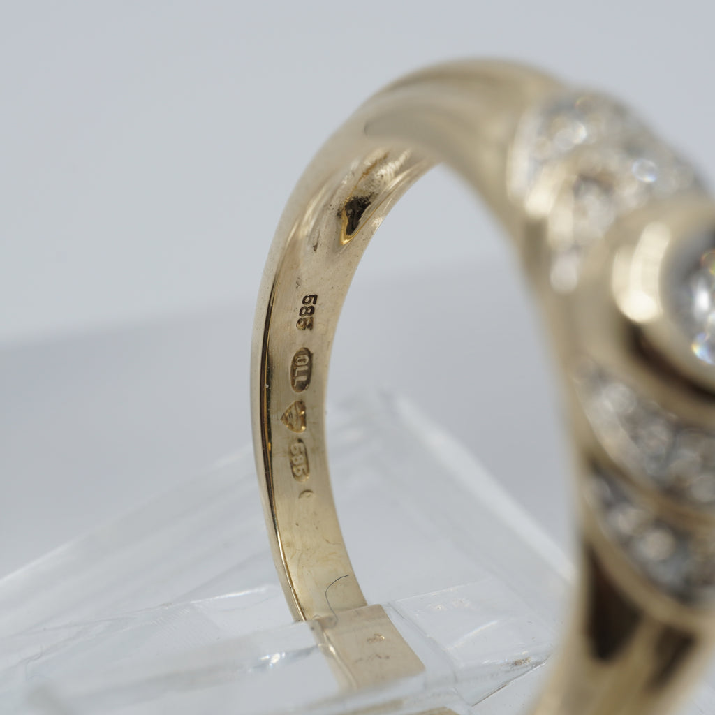 14K Gold 11- Diamond Wave ring