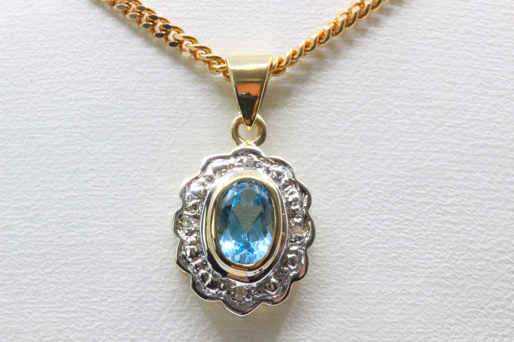 14K Gold Oval Blue Stone Pendant