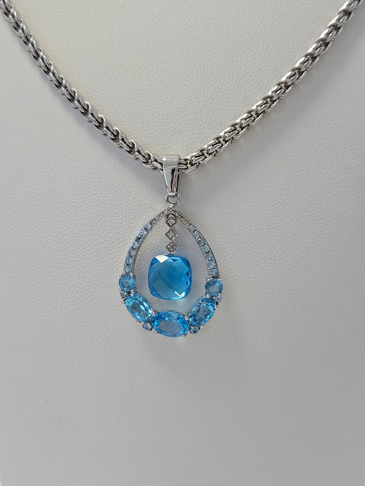 14K White Gold Blue Topaz & 12 Diamond Pendant