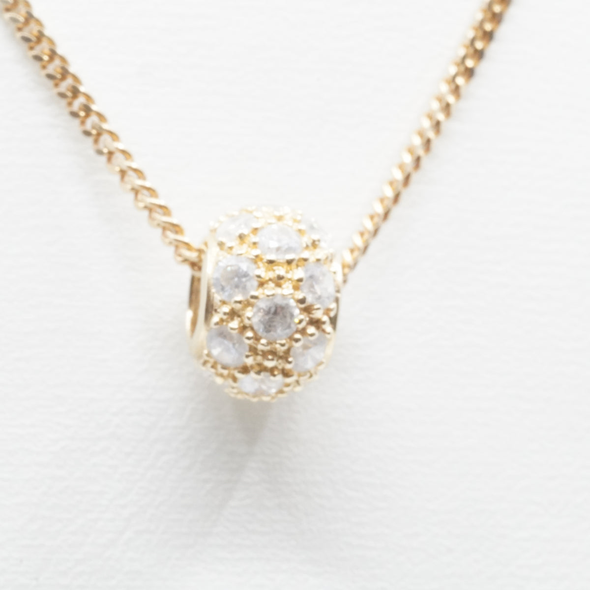 14K Gold Circular Pendant with Clear Stones