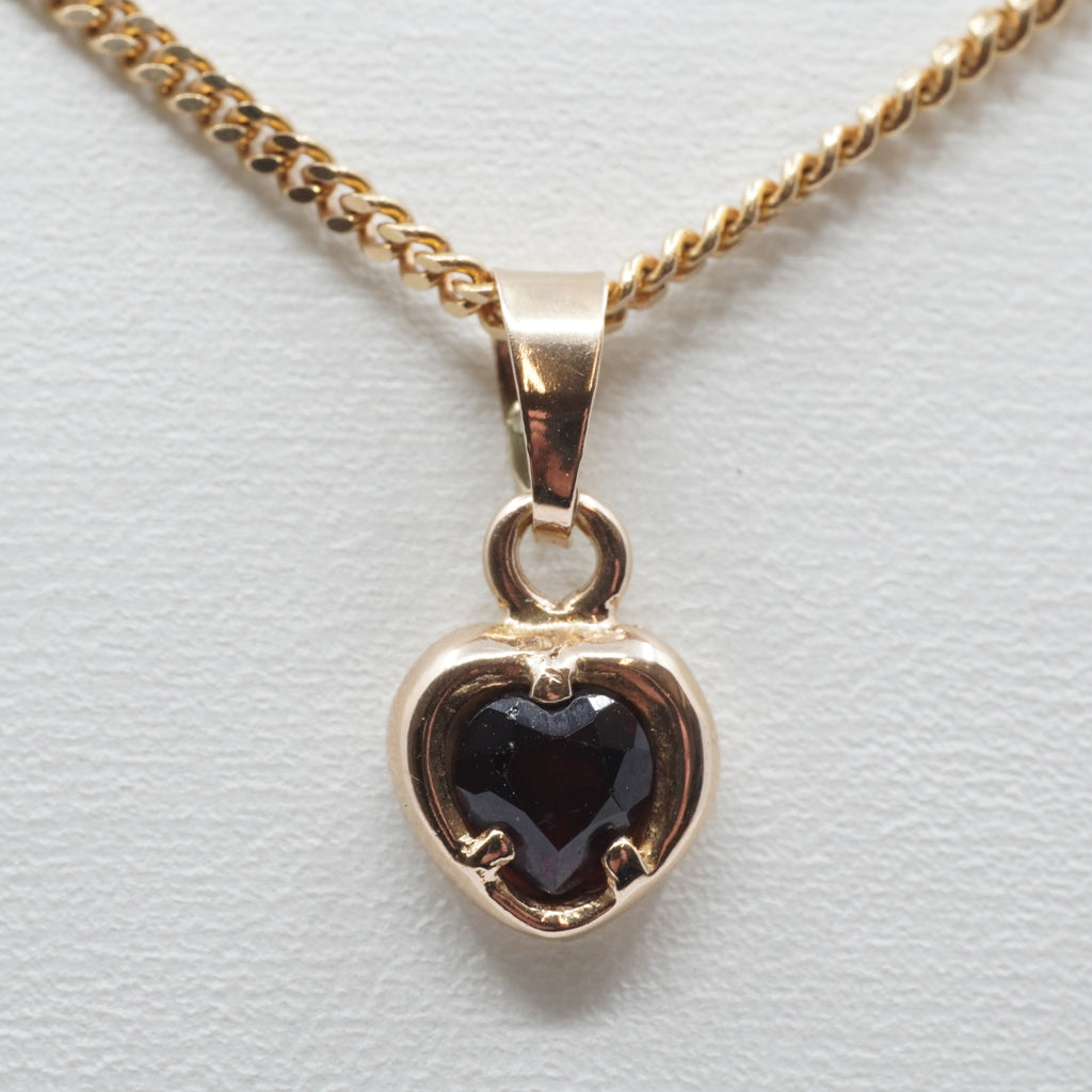 14K Gold Heart Pendant with Dark Stone