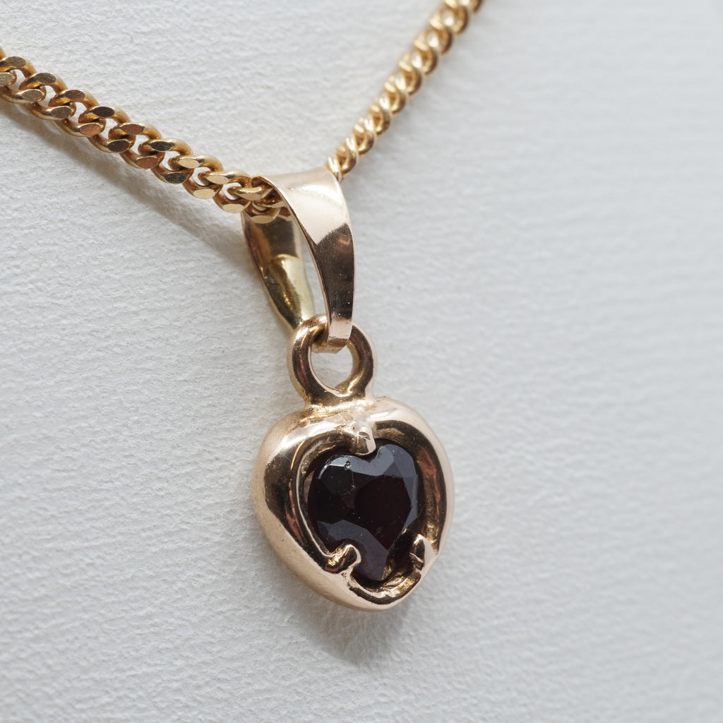 14K Gold Heart Pendant with Dark Stone