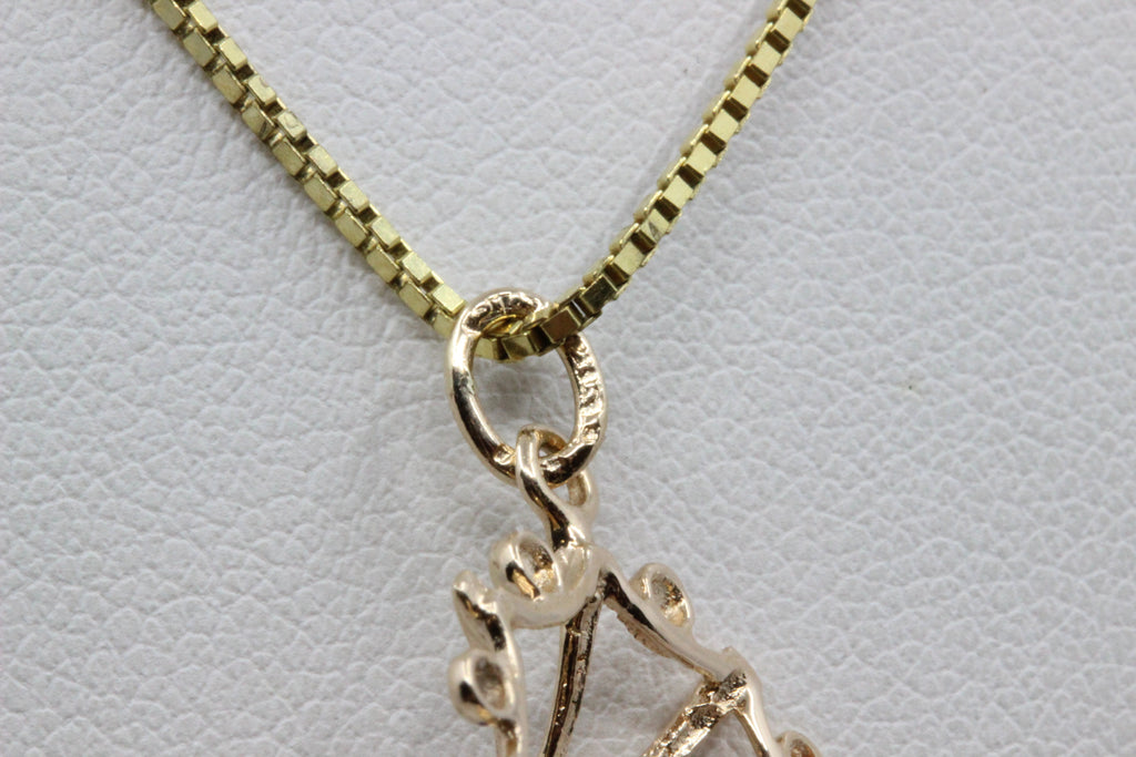 14K Gold Blue Stone Floral Pendant