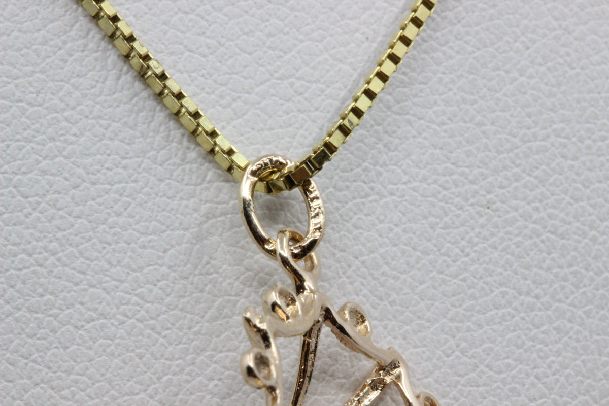 14K Gold Blue Stone Floral Pendant
